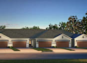 Thumbnail 43 of 44 - A large house with a grey roof and four garages.