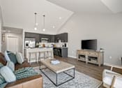 Thumbnail 1 of 18 - A modern living room with a brown leather couch and a wooden coffee table.