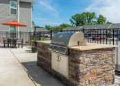 Thumbnail 14 of 25 - our outdoor kitchen has a grill and a pizza oven on our patio