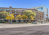 Thumbnail 42 of 44 - A street view with a Saldin Cancer Center in the background.