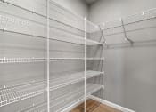 Thumbnail 18 of 24 - the closeness of the closets in the closet room of a home