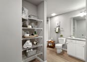 Thumbnail 16 of 24 - a bathroom with a shower and a toilet and a sink