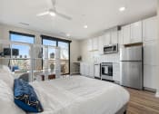 Thumbnail 26 of 82 - waterford bluffs apartments  studio bedroom and kitchen