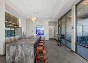 Thumbnail 49 of 82 - waterford bluffs clubhouse kitchen with bar seats