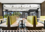 Thumbnail 40 of 82 - a rendering of a restaurant with yellow booths and a checkered floor