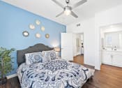 Thumbnail 20 of 37 - Bedroom With Ceiling Fan at LEVANTE APARTMENT HOMES, California, 92335