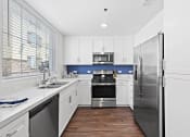 Thumbnail 19 of 37 - Fully Equipped Kitchen at LEVANTE APARTMENT HOMES, Fontana, CA, 92335
