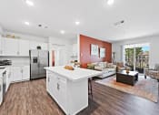 Thumbnail 23 of 37 - Kitchen & Living Area at LEVANTE APARTMENT HOMES, California