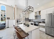 Thumbnail 8 of 37 - Demonstration Kitchen at LEVANTE APARTMENT HOMES, Fontana, CA, 92335