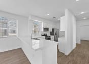 Thumbnail 26 of 37 - Kitchen & Dining Area at LEVANTE APARTMENT HOMES, Fontana, California