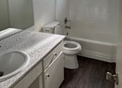 Thumbnail 35 of 35 - an empty bathroom with a toilet and a sink