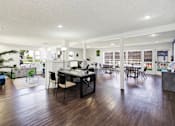 Thumbnail 10 of 27 - Modern office space with open floor plan at ELEVATE Apartments HOMES, Placentia, 92870