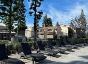 Thumbnail 22 of 28 - Poolside Lounge Chairs Area at ELEVATE, California, 92870