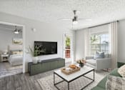 Thumbnail 9 of 32 - A modern living room with a flat screen TV, a sofa, a coffee table, and a bed.