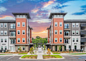 Thumbnail 7 of 43 - Two identical buildings are situated next to each other.