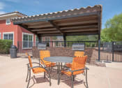 Thumbnail 13 of 41 - outdoor seating and eating area with shade