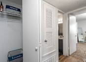 Thumbnail 10 of 28 - A white door with a sign that says "HOME" on it.