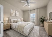Thumbnail 5 of 18 - A bedroom with a large bed, a ceiling fan, and a nightstand with a lamp.