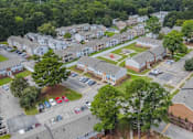 Thumbnail 16 of 30 - an aerial view of a neighborhood with houses and trees