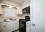 Thumbnail 9 of 32 - Chef-Inspired Kitchens Feature Stainless Steel Appliances at Arbor Pointe at Hillcrest, Arkansas