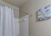 Thumbnail 16 of 35 - Guest bathroom with tile flooring at Bermuda Estates Apartments in Ormond Beach, FL