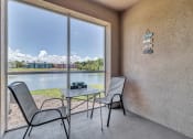 Thumbnail 18 of 35 - Screened patio and balcony at Bermuda Estates Apartments in Ormond Beach, FL