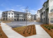Thumbnail 48 of 50 - new apartments and large parking lot at Tapestry Overbrook in McDonough, Georgia
