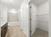 Thumbnail 10 of 50 - bathroom with walk-in closet at Tapestry Overbrook in McDonough, Georgia