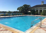 Thumbnail 20 of 33 - Swimming pool at Legacy at Crystal Lake Apartments in Port Orange, Florida