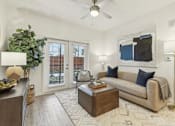 Thumbnail 9 of 39 - living room with designer plank flooring at Tapestry Headwaters Apartments in Kissimmee, FL