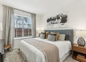 Thumbnail 14 of 39 - a bedroom with a large bed and a window at Tapestry Headwaters in Kissimmee, FL