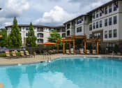 Thumbnail 25 of 54 - Resort-style Pool with covered seating at 4700 Colonnade Apartments in Birmingham, AL