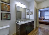 Thumbnail 15 of 54 - Modern Bathroom with Wood Style Floors at 4700 Colonnade Apartments in Birmingham, AL