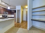 Thumbnail 18 of 54 - Wood-look floors and ample storage in kitchen at 4700 Colonnade Apartments in Birmingham, AL