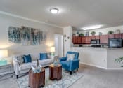 Thumbnail 4 of 35 - Open Concept Living and Kitchen at Bermuda Estates Apartments in Ormond Beach, FL