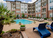 Thumbnail 2 of 38 - our apartments offer a swimming pool with lounge chairs