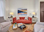 Thumbnail 4 of 55 - A modern living room with high ceilings