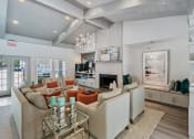 Thumbnail 20 of 24 - clubhouse with fireplace and kitchen at Retreat at Brightside Apartments in Baton Rouge, LA
