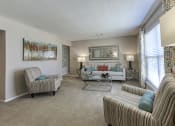 Thumbnail 1 of 32 - living room with large windows at Ascent Jones Apartments in Huntsville, Alabama