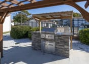 Thumbnail 21 of 32 - grilling station and pergola at Ascent Jones Apartments in Huntsville, Alabama