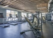 Thumbnail 14 of 32 - Cardio equipment at Ascent Jones Apartments in Huntsville, Alabama