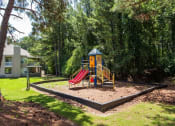 Thumbnail 15 of 34 - the playground is in the middle of a yard with a slide