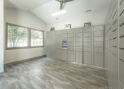 Thumbnail 16 of 34 - a large room with many lockers and a window