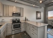 Thumbnail 14 of 41 - Fully Equipped Kitchen at The Tower Apartments, Tuscaloosa