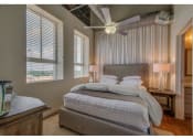 Thumbnail 24 of 41 - Bedroom With Expansive Windows at The Tower Apartments, Tuscaloosa, AL, 35401