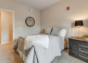 Thumbnail 12 of 34 - Furnished Carpeted Bedroom At Austin Place Apartments