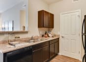 Thumbnail 7 of 34 - Austin Place Apartment Kitchen