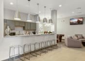 Thumbnail 18 of 34 - Bar Seating in Clubroom at Austin Place Apartments