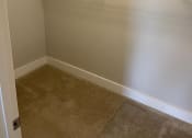 Thumbnail 14 of 29 - Walk-in closet with shelving system at Flats on 4th Apartments in Birmingham, AL