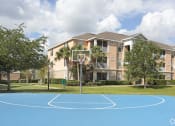 Thumbnail 25 of 33 - Basketball court at Legacy at Crystal Lake Apartments in Port Orange, Florida